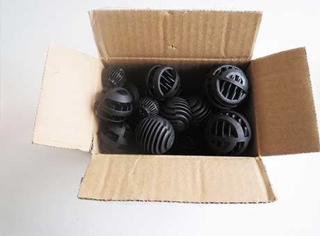 There is a bag of bio filter media packed with carton